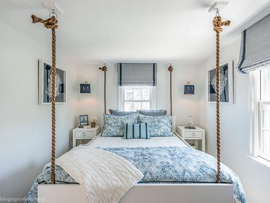 Guest bedroom with rope by Casabella Interiors